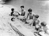 Sunbathing on the riverbank / Мальчики, загорающие на берегу реки