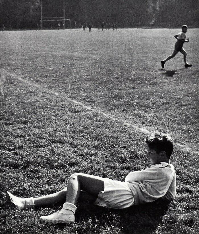 French young soccer boy on grass field (Юный французский футболист на траве поля), 1960s