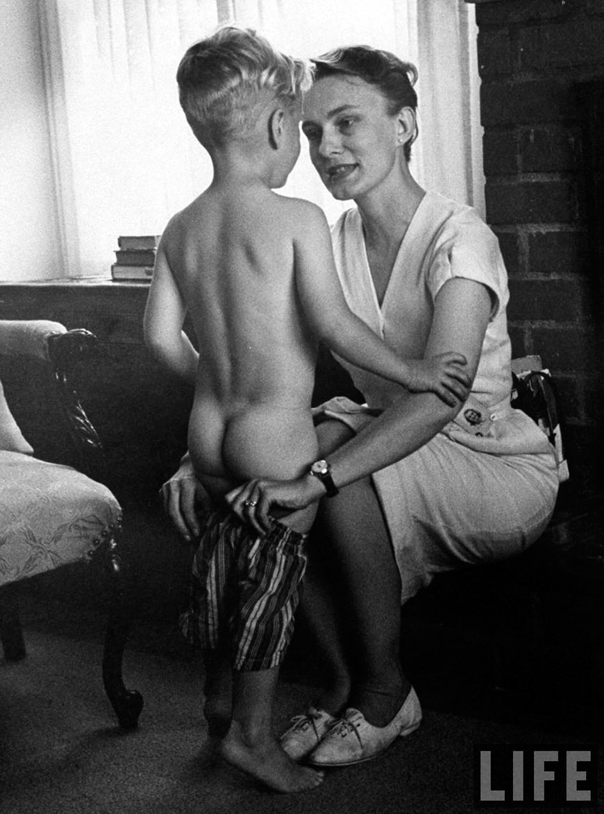 Mrs. Maryly Van Leer Peck, engineer with Rocketdyne Corp. in Calif, spending some time with her son, 1962