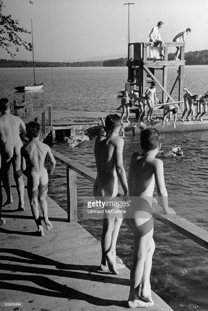 Bare bottomed young boys participating in swimming activity at camp (Голозадые мальчики, практикующиеся в плавании, в летнем лагере), July 1946